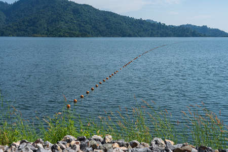 Floating ball buoys indicate safe zones in the water.の写真素材