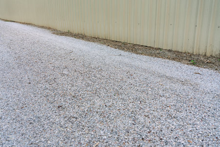 Photo of a gravel road in a gardenの写真素材