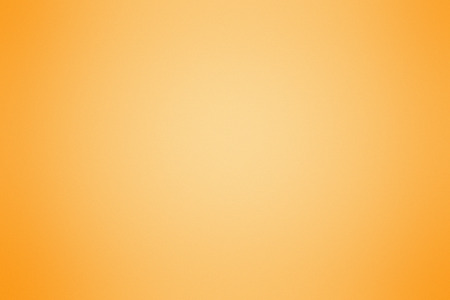 Orange blurred gradient background with soft transition.の写真素材