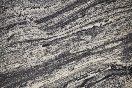 Closeup grey granite stone with natural pattern texture background.の写真素材