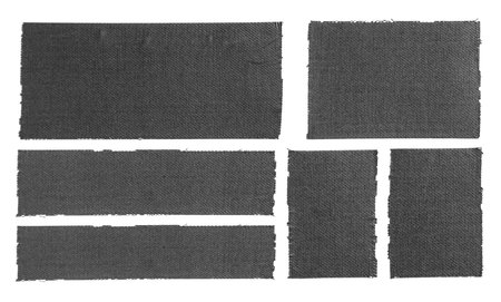 Set of different pieces of black matte cloth gaffer tape isolated on white background. Can be used for text.の写真素材