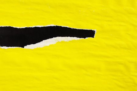 Yellow and black crumpled and torn gloss paper posters with rough surface. Can be used for text.