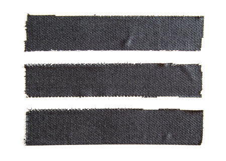 Three pieces of black matte cloth gaffer tape isolated on white background.
