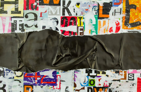 Torn and crumpled black glossy paper on abstract colorful collage of magazine paper pieces and...