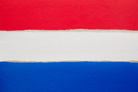 Netherlands national flag made of colored torn paper cardboard.の写真素材