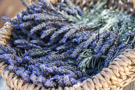 Basket with lavender flowers close-upの写真素材