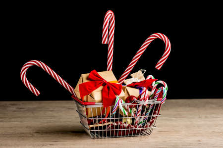 Close up of a shopping basket full of Christmas giftsの写真素材