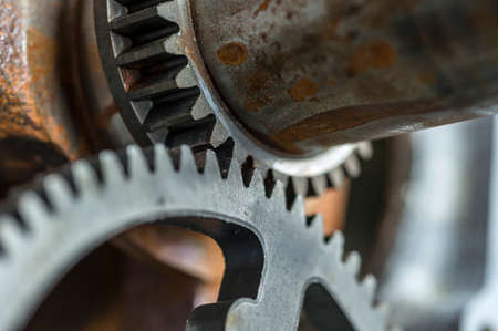 Macro shot of an old rusty gear mechanismの写真素材