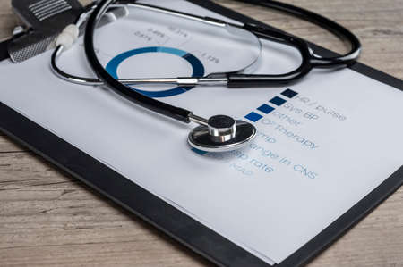 Stethoscope on health condition chart closeupの写真素材