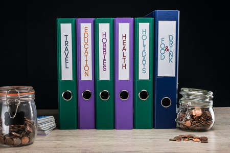 Box files with family expenses in categoriesの写真素材