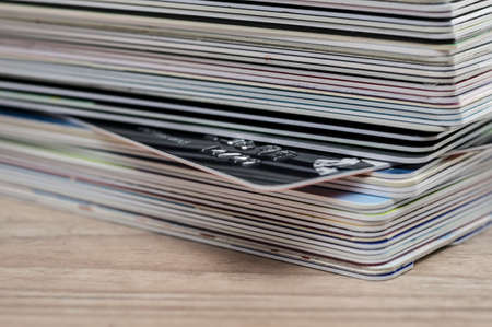 Close up of credit cards stacked into a pileの写真素材