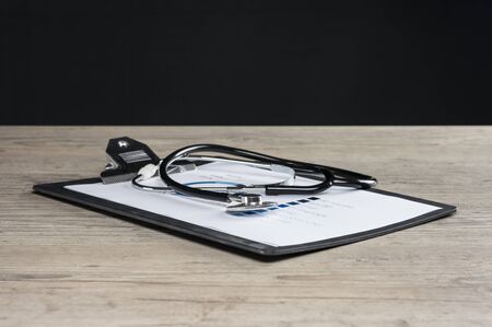 Stethoscope on health condition chart closeupの写真素材