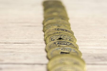 Close up shot of golden feng shui coinsの写真素材