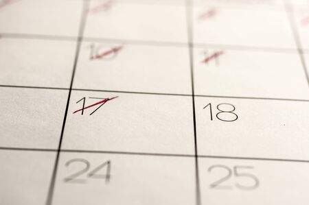 Close up shot of a calendar with marked out datesの写真素材