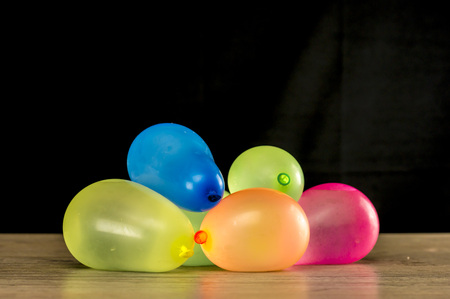 Close up shot of multi colored water balloonsの写真素材