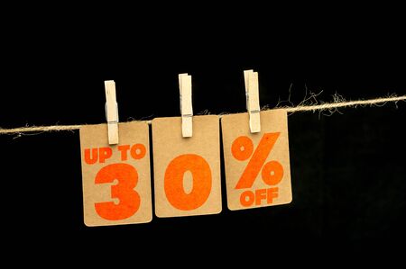 Close up shot of hanging tags that assemble 30 percent discountの写真素材