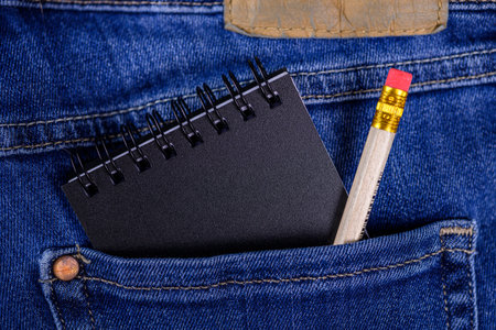 Notepad and pencil in pocket