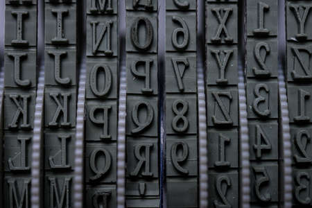 Rolling rubber stamp letters and numbers macro shot.の写真素材