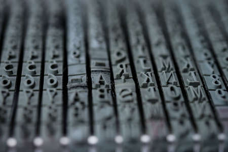 Rolling rubber stamp letters and numbers macro shot.の写真素材