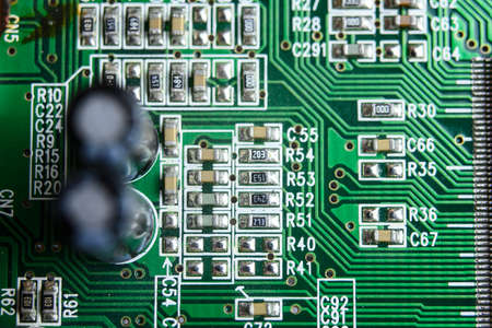 Close up shot of electronic circuit board with componentsの写真素材