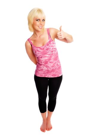 woman in pink and black giving a thumbs upの写真素材