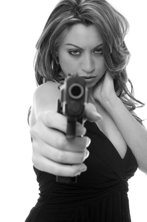 Attractive woman with a gunの写真素材