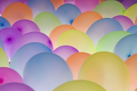 abstract texture background of backlite colorful ballons in different sizesの写真素材