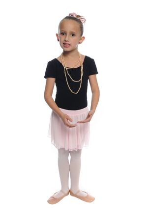 cute young girl posing in a dance costume on a white backgroundの写真素材