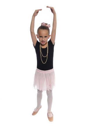 cute young girl posing in a dance costume on a white backgroundの写真素材