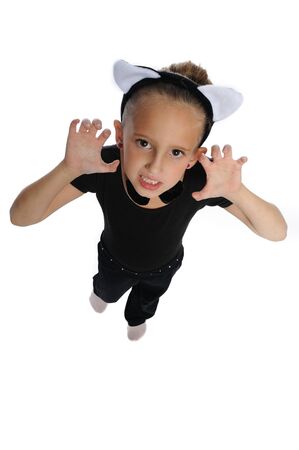 cute young girl posing in a dance costume on a white backgroundの写真素材