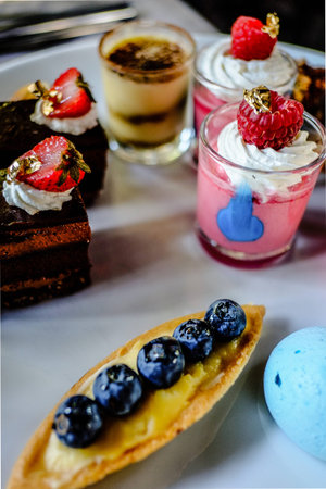 various delicious desserts presented on a white plate