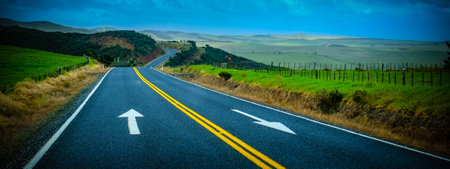 street with arrows painted on the surface. scenic viewの写真素材