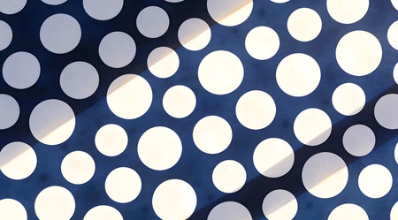 A creative digital illustration depicting Professional seamless digital illustration of polka dot pattern in navy and white, uniform circular motifs, playful retro lighting, versatile fun mood. This AI-generated artwork features unique visual elements suitable for various commercial and editorial applications. AI-generated illustration.の素材