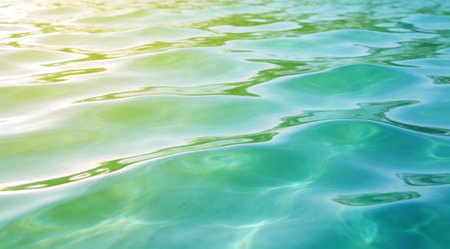 A creative digital illustration depicting Artistic commercial rendering with gentle gradient blends in seafoam green to turquoise, subtle ripple patterns, bright diffused sunlight, vibrant refreshing mood, high-quality seamless background. This AI-generated artwork features unique visual elements suitable for various commercial and editorial applications. AI-generated illustration.の素材