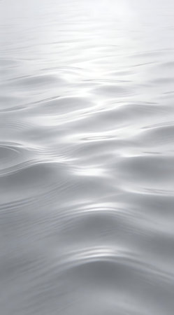 Elegant minimalist digital artwork featuring subtle ripple textures in soft light gray hues, evoking a serene and professional mood with vast neutral expanses and gentle ambient illumination. Perfect for commercial uses in corporate branding, website designs, presentation backdrops, app interfaces, and marketing materials, offering clean versatility for moder... AI-generated digital illustration. AI-generated illustration.の素材