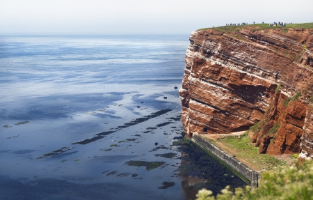 Helgoland in the Northsea with the birds and dark blue sea waterの写真素材