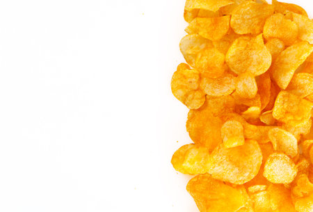many potato chips with text space on a white background