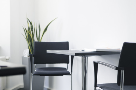 an office workstation with desk without peopleの写真素材