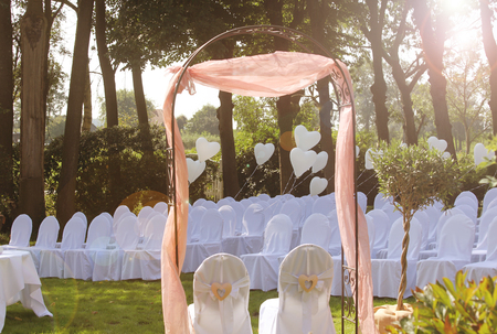 a summer garden festively decorated for a weddingの写真素材