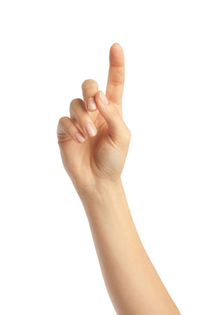 a hand with lifted forefinger on white backgroundの写真素材
