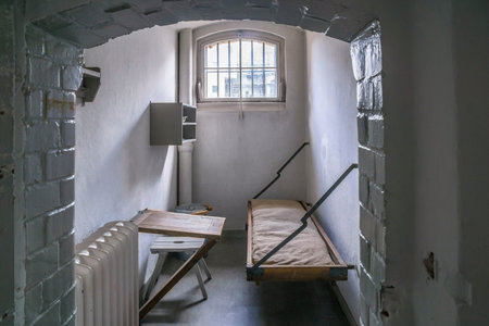 Cell interior at abandoned jail prison.の写真素材