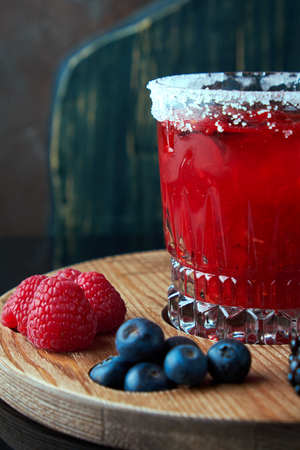 Alcoholic cocktail with berriesの写真素材