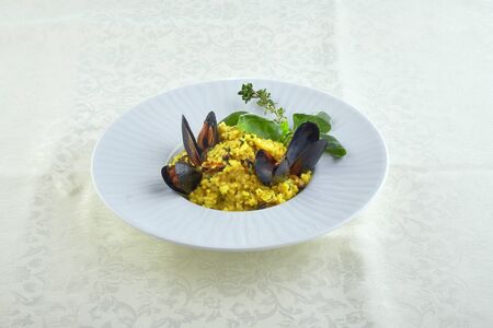 Risotto on a white plateの写真素材