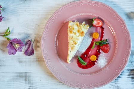 Tiramisu dessert on wooden table. Top view with copy space jpgの写真素材