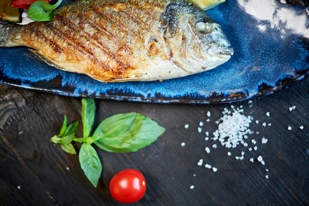 Grilled Fish dish - roasted fish and vegetables jpgの写真素材