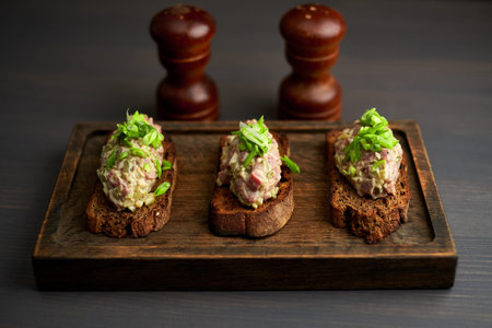 bruschetta, on slices of toasted baguette garnished with basil