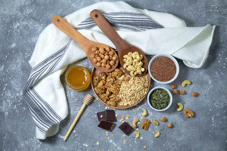 Various nuts on stone table. Top view with copy spaceの写真素材