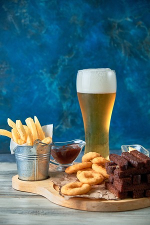 a variety of snacks for light beer in a glassの写真素材