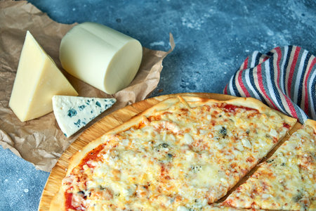 Slice of hot pizza large cheese lunch or dinner crust seafood meat topping sauce. with bell pepper...