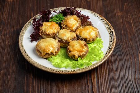 Stuffed champignons in the plateの写真素材